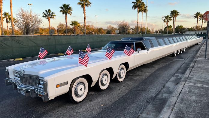 World's longest car has 26 wheels, putting green, helipad and swimming pool
